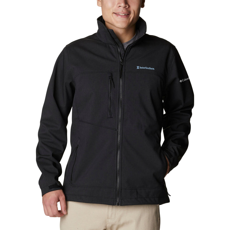 man in black jacket with full zipper light blue logo