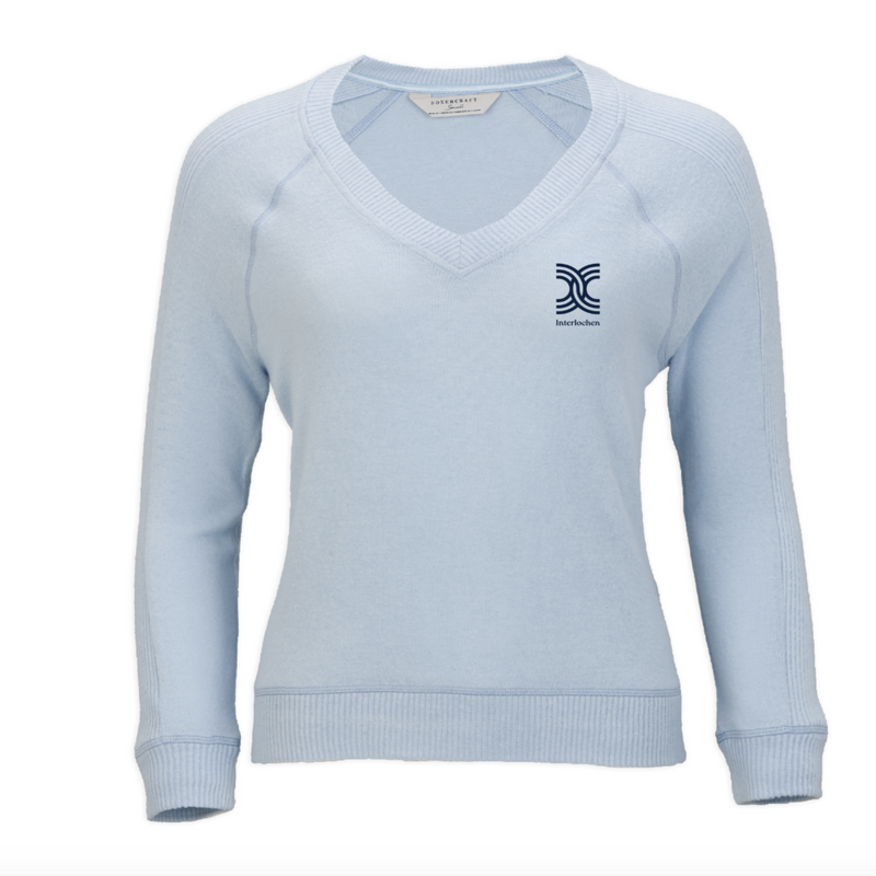 Light blue sweater with a logo on a white background