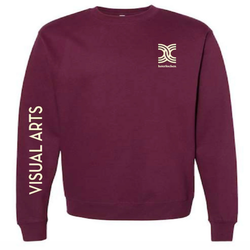 A maroon crew neck sweatshirt with white text that reads 'Visual Arts' and a symbol on the left chest area.